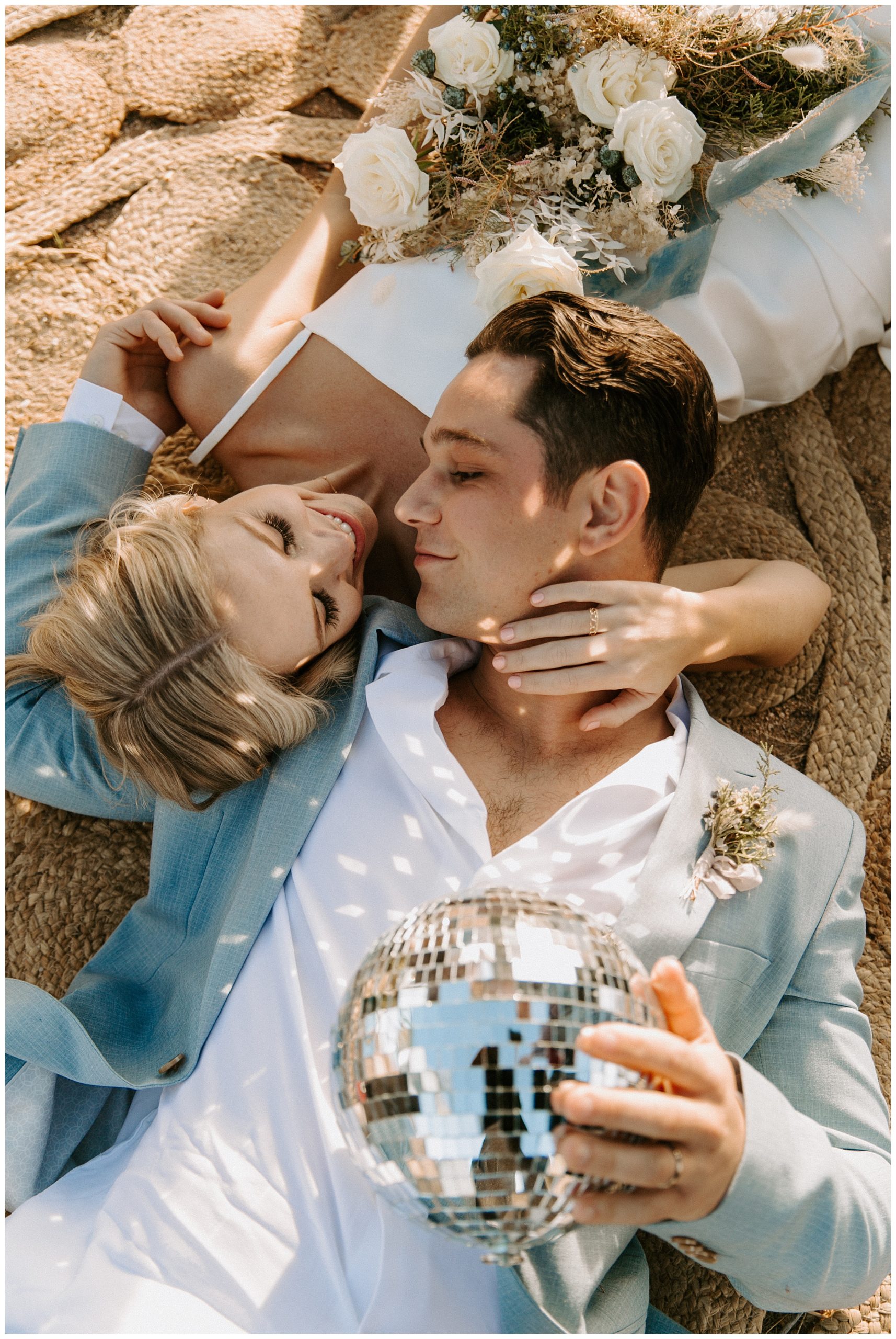 bride and groom with disco ball, disco elopement, elopement with disco ball
