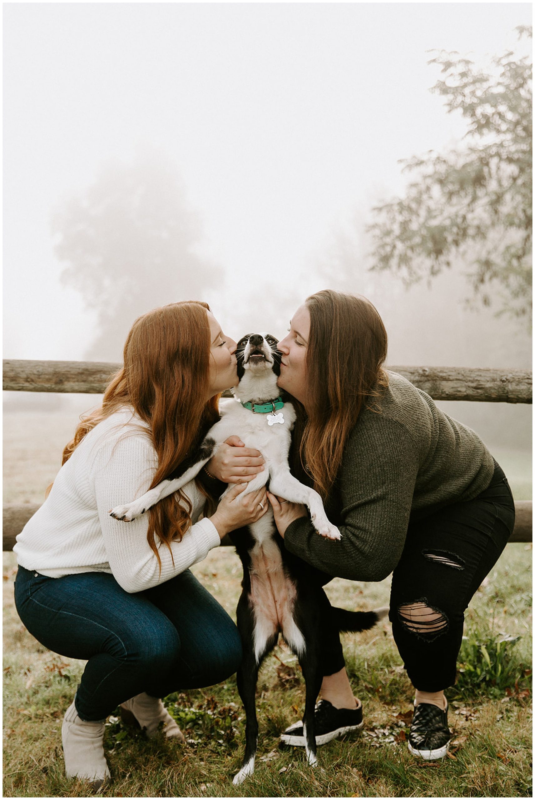 girls kissing dog for engagement photos