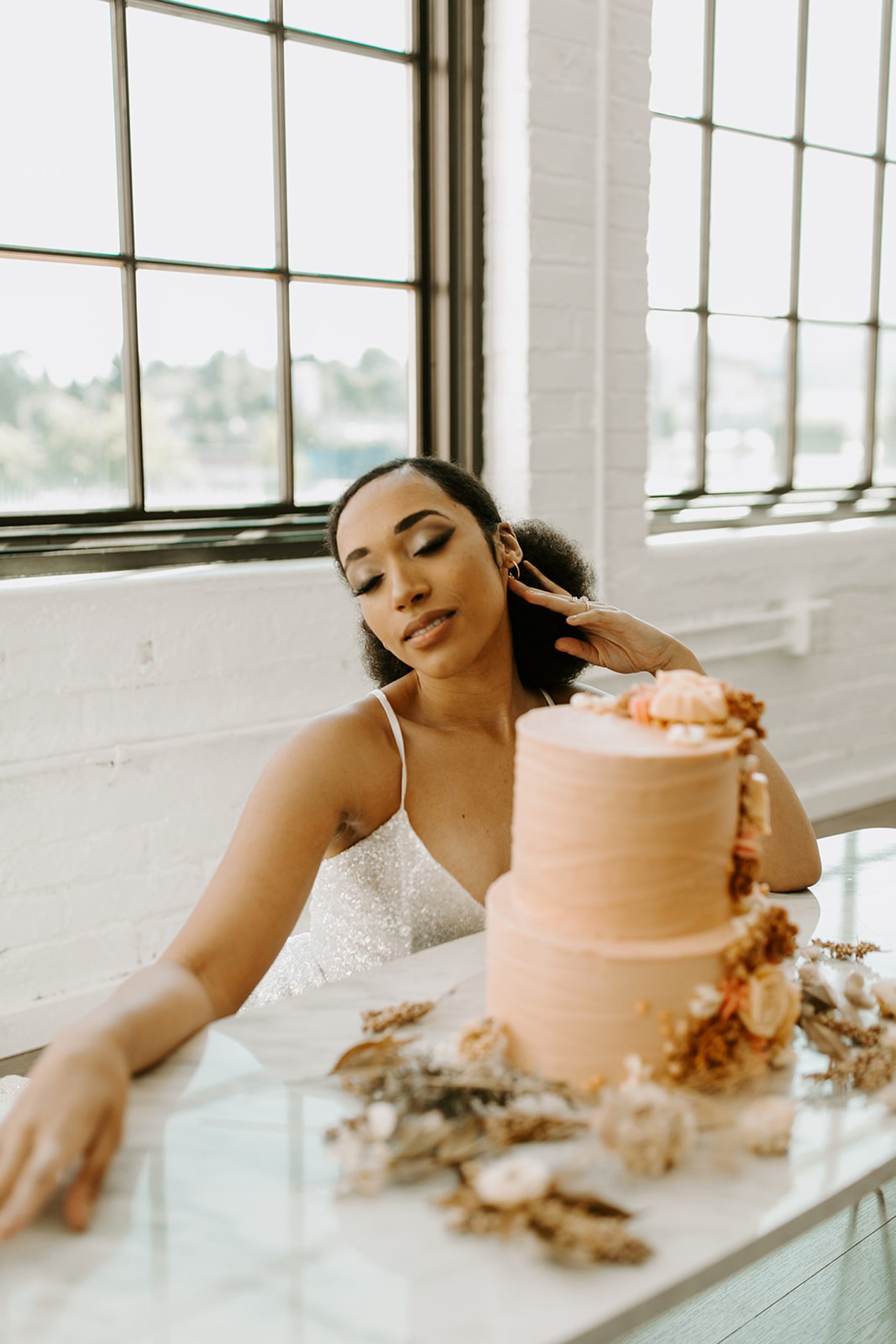 bride and boho wedding cake