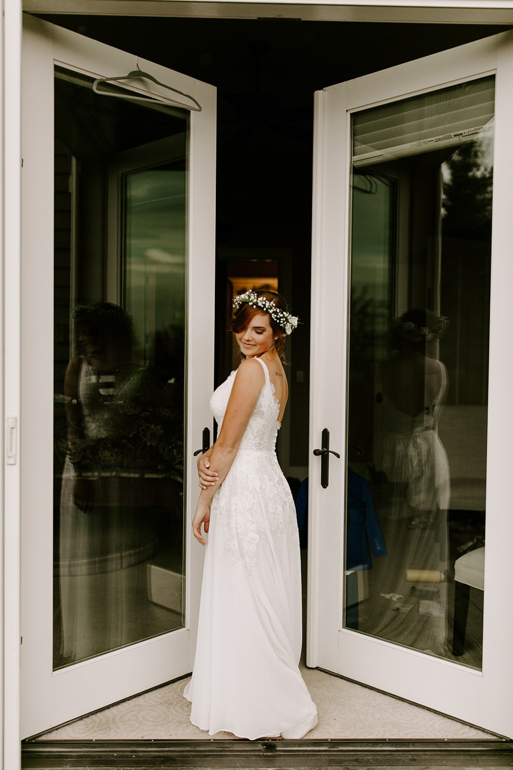 bride standing in wedding dress