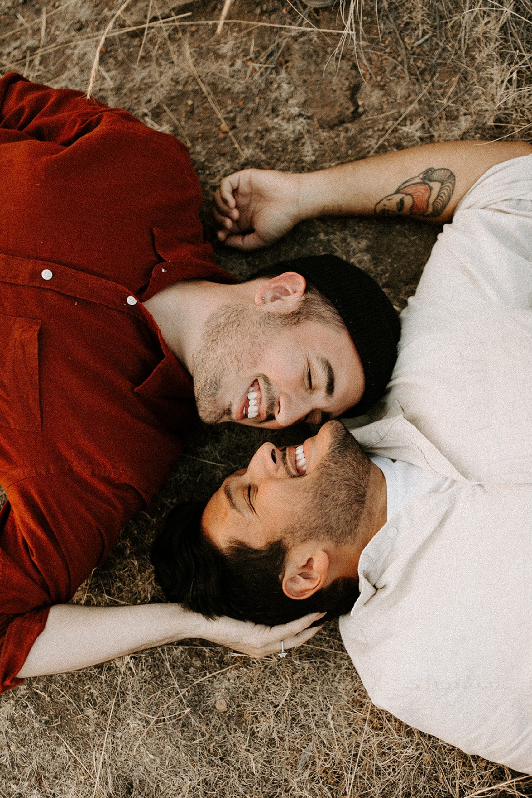 couple laying on the ground