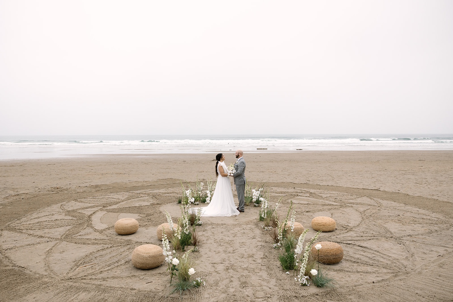 bride in white gown with her groom at the alter of their Oregon coast elopement