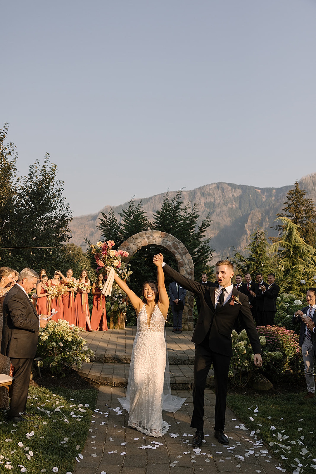 a bride and groom celebrating at their Columbia Gorge wedding